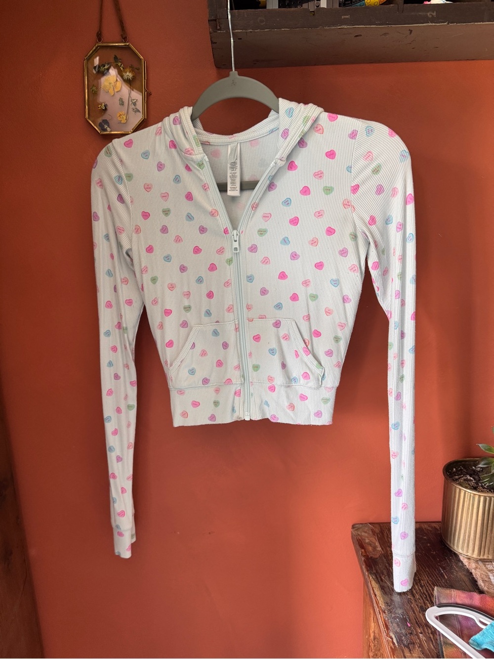 SKIMS White Zip-Up Hoodie with Pink Blue Green Heart Print
